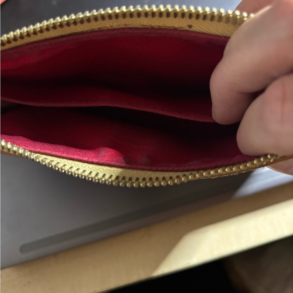 Dooney & Bourke Sports-Themed Wristlet with Black and Brown Accents - Picture 7 of 8